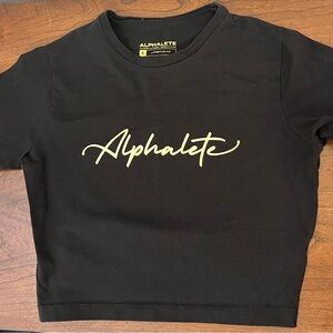Alphalete women’s Black Tee Crop with Gold Logo